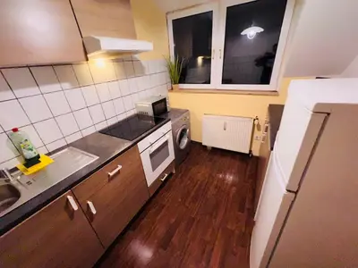 Küche/Küchenzeile in der Unterkunft Comfort Apartments - Sky Bundesliga, PlayStation, Grill & Balkon - Haus Burgstadt