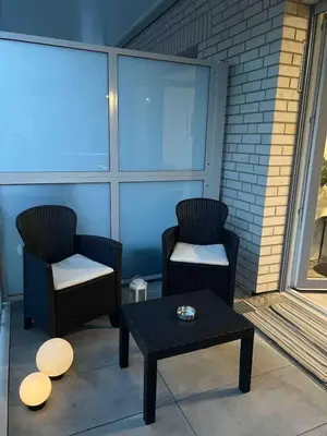 Ein Sitzbereich in der Unterkunft Luxuriöses Apartment,Neubau, 4 Personen, Parkplatz, Griechischer Stil