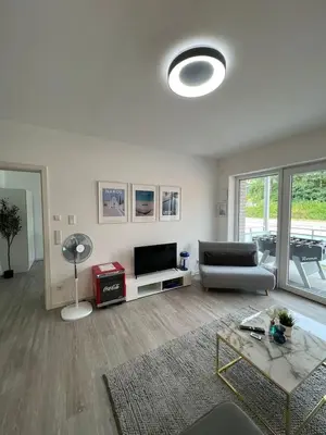 Ein Sitzbereich in der Unterkunft Luxuriöses Apartment,Neubau, 4 Personen, Parkplatz, Griechischer Stil