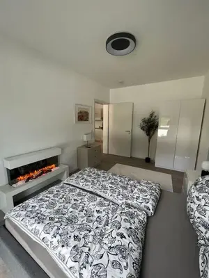 Ein Bett oder Betten in einem Zimmer der Unterkunft Luxuriöses Apartment,Neubau, 4 Personen, Parkplatz, Griechischer Stil