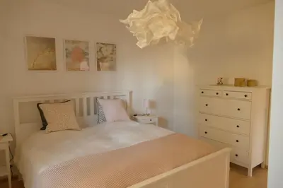 Ein Bett oder Betten in einem Zimmer der Unterkunft Ferienwohnung Wengerner Mühle