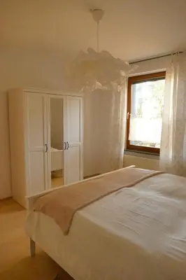 Ein Bett oder Betten in einem Zimmer der Unterkunft Ferienwohnung Wengerner Mühle