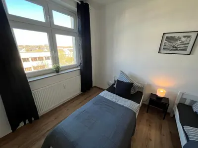 Ein Bett oder Betten in einem Zimmer der Unterkunft Apartment Central 85I 55 qm Wi-Fi free