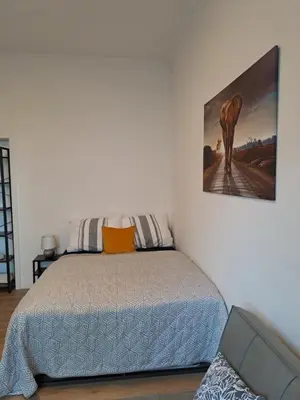 Ein Bett oder Betten in einem Zimmer der Unterkunft Velbert am Berg