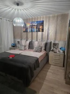 Ein Bett oder Betten in einem Zimmer der Unterkunft schlafgut24