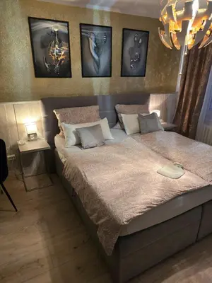 Ein Bett oder Betten in einem Zimmer der Unterkunft schlafgut24