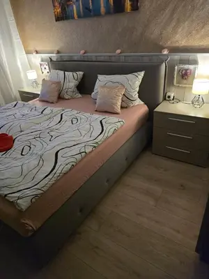 Ein Bett oder Betten in einem Zimmer der Unterkunft schlafgut24