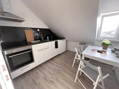 Küche/Küchenzeile in der Unterkunft Zentrale Wohnung für 4 mit Bett und Schlafcouch