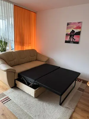 Ein Sitzbereich in der Unterkunft Marl Central Apartment