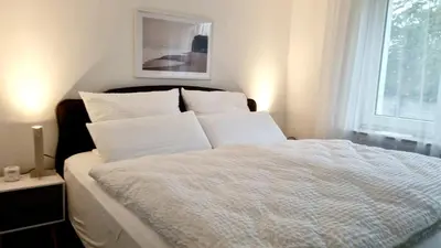 Ein Bett oder Betten in einem Zimmer der Unterkunft 2-Zimmer I Küche I Balkon I WLAN I Prime I Parken