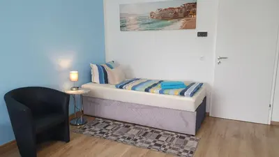 Ein Bett oder Betten in einem Zimmer der Unterkunft Die ideale Wohnung für 2 Personen