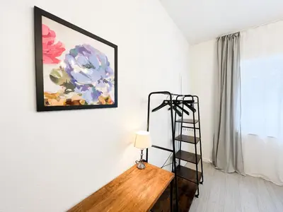 Ein Bett oder Betten in einem Zimmer der Unterkunft Apartment Düsseldorf City