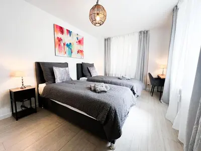 Ein Bett oder Betten in einem Zimmer der Unterkunft Apartment Düsseldorf City