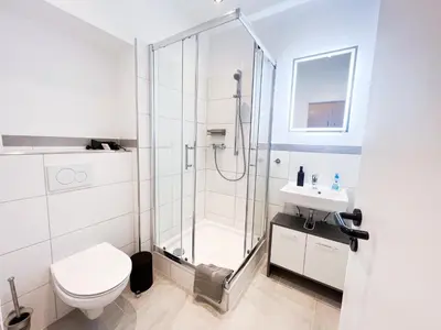 Ein Badezimmer in der Unterkunft Apartment Düsseldorf City