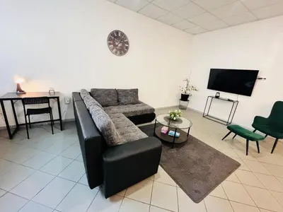 TV/Unterhaltungsangebot in der Unterkunft Apartment Central 10D 55qm Wi-Fi free Parking calm back house