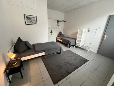 Ein Sitzbereich in der Unterkunft Apartment Central 10D 55qm Wi-Fi free Parking calm back house