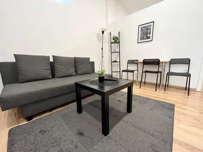 Ein Sitzbereich in der Unterkunft Apartment Central 10A 40qm Wi-Fi free Parking calm back house