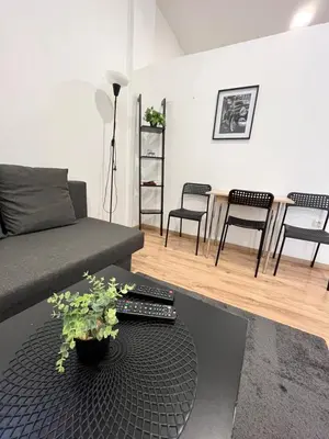 Ein Sitzbereich in der Unterkunft Apartment Central 10A 40qm Wi-Fi free Parking calm back house