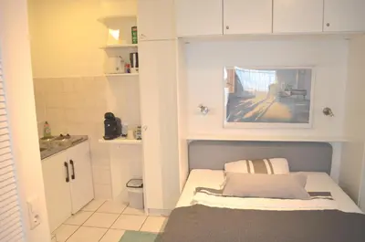 Ein Bett oder Betten in einem Zimmer der Unterkunft AV No.1