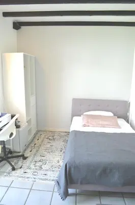 Ein Bett oder Betten in einem Zimmer der Unterkunft AV No.1