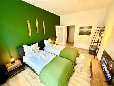 Ein Bett oder Betten in einem Zimmer der Unterkunft Das Berg Apartment Rüttenscheid, Netflix, nahe Messe, Klinikum