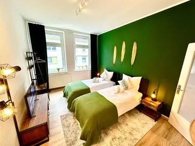 Ein Bett oder Betten in einem Zimmer der Unterkunft Das Berg Apartment Rüttenscheid, Netflix, nahe Messe, Klinikum