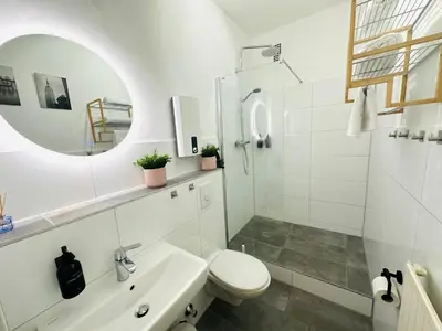 Ein Badezimmer in der Unterkunft Das Berg Apartment Rüttenscheid, Netflix, nahe Messe, Klinikum