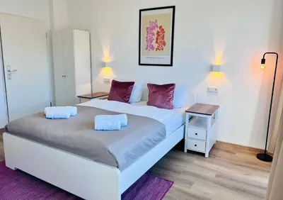 Ein Bett oder Betten in einem Zimmer der Unterkunft Apartment Duisburg Hbf Zentrum Business Messe Düsseldorf