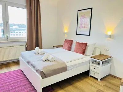 Ein Bett oder Betten in einem Zimmer der Unterkunft Apartment Duisburg Hbf Zentrum Business Messe Düsseldorf