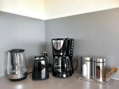 Kaffee-/Teezubehör in der Unterkunft Stilvolles Apartment mit ländlichem Ausblick