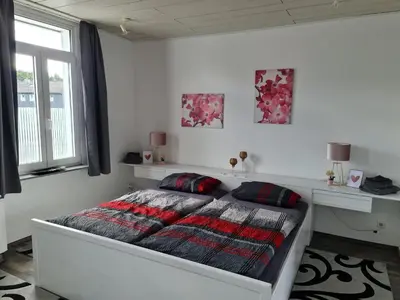 Ein Bett oder Betten in einem Zimmer der Unterkunft Drea's Ferienwohnung