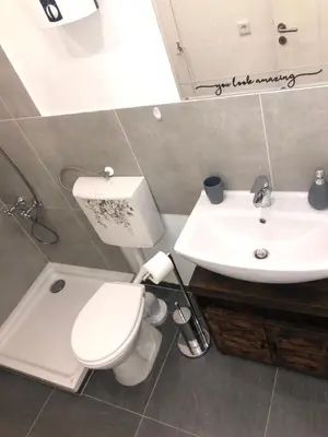 Ein Badezimmer in der Unterkunft Grüne Oase mit Balkon I EG
