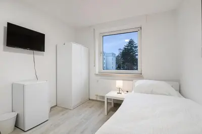 Ein Bett oder Betten in einem Zimmer der Unterkunft Work & Stay Apartment mit Balkon in Bergkamen