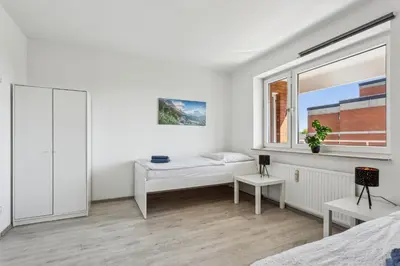 Ein Bett oder Betten in einem Zimmer der Unterkunft Work & Stay Apartment mit Balkon in Bergkamen