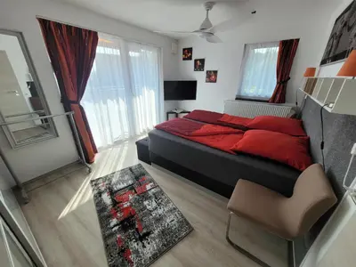 Ein Bett oder Betten in einem Zimmer der Unterkunft Penthouse-Apartment AM KORNFELD