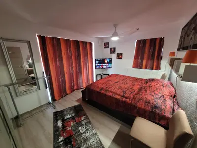 Ein Bett oder Betten in einem Zimmer der Unterkunft Penthouse-Apartment AM KORNFELD