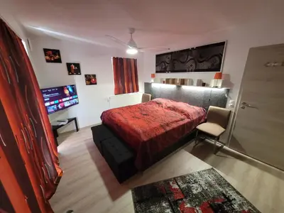 Ein Bett oder Betten in einem Zimmer der Unterkunft Penthouse-Apartment AM KORNFELD