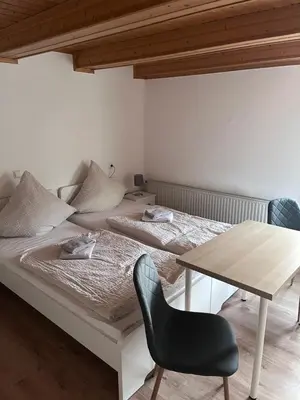 Ein Bett oder Betten in einem Zimmer der Unterkunft Hotel Bollerott