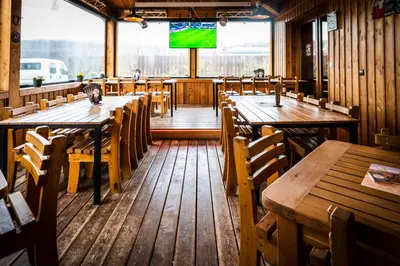 TV/Unterhaltungsangebot in der Unterkunft Roadcamp - American Motel & Sportsbar