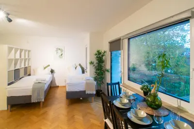 Ein Bett oder Betten in einem Zimmer der Unterkunft Cozy apartment with kitchen + balcony NEW!