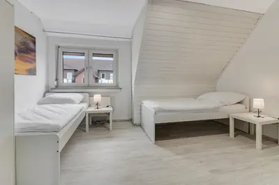 Ein Bett oder Betten in einem Zimmer der Unterkunft Unterkunft mit Balkon in Lünen