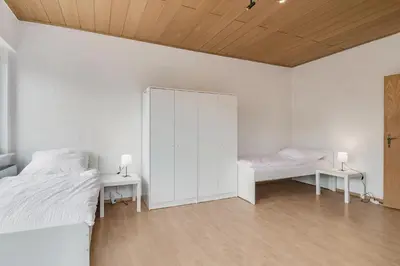 Ein Bett oder Betten in einem Zimmer der Unterkunft Unterkunft mit Balkon in Lünen