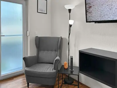 TV/Unterhaltungsangebot in der Unterkunft Relax Oasis with 65 SmartTV, Kitchen and Balcony