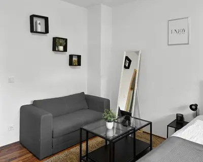 Ein Sitzbereich in der Unterkunft Relax Oasis with 65 SmartTV, Kitchen and Balcony