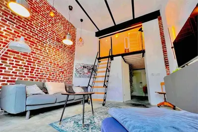 Ein Bett oder Betten in einem Zimmer der Unterkunft Luxus Loft im Herzen von Bochum Werne.