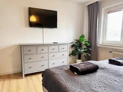 Ein Bett oder Betten in einem Zimmer der Unterkunft 3 Zimmer Apartment mit Garten
