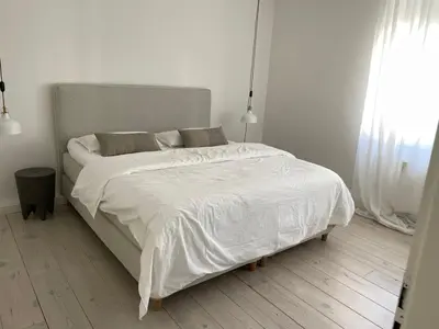 Ein Bett oder Betten in einem Zimmer der Unterkunft Haus mit Türmchen