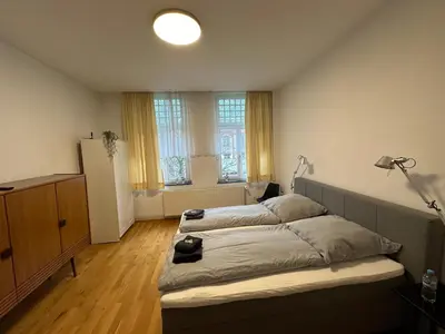 Ein Bett oder Betten in einem Zimmer der Unterkunft Jugendstil-Oase