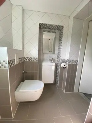 Ein Badezimmer in der Unterkunft Apartmenthaus Bella Casa