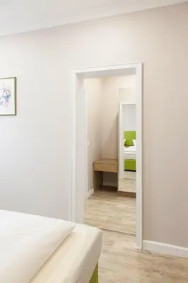Ein Bett oder Betten in einem Zimmer der Unterkunft Hotel Engelbert